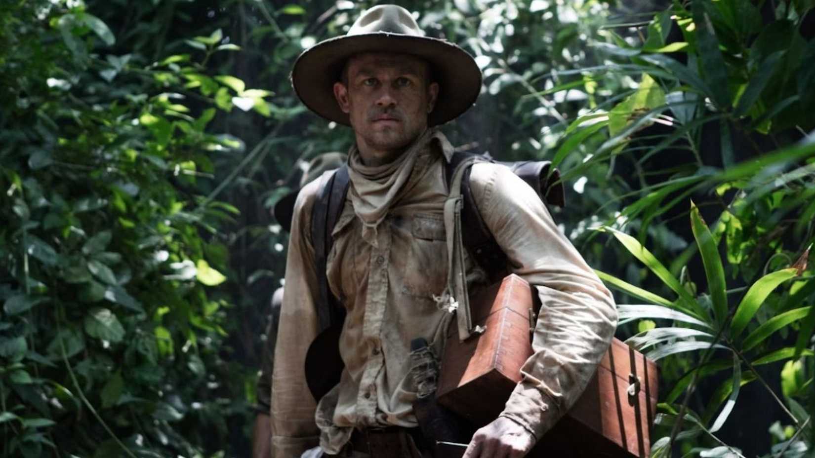charlie hunnam as percy fawcett standing in the forest in the lost city of z