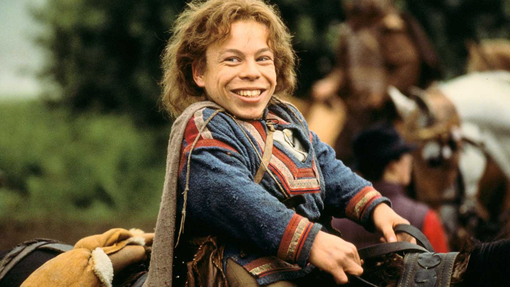 Warwick Davis as Willow Ufgood on horseback