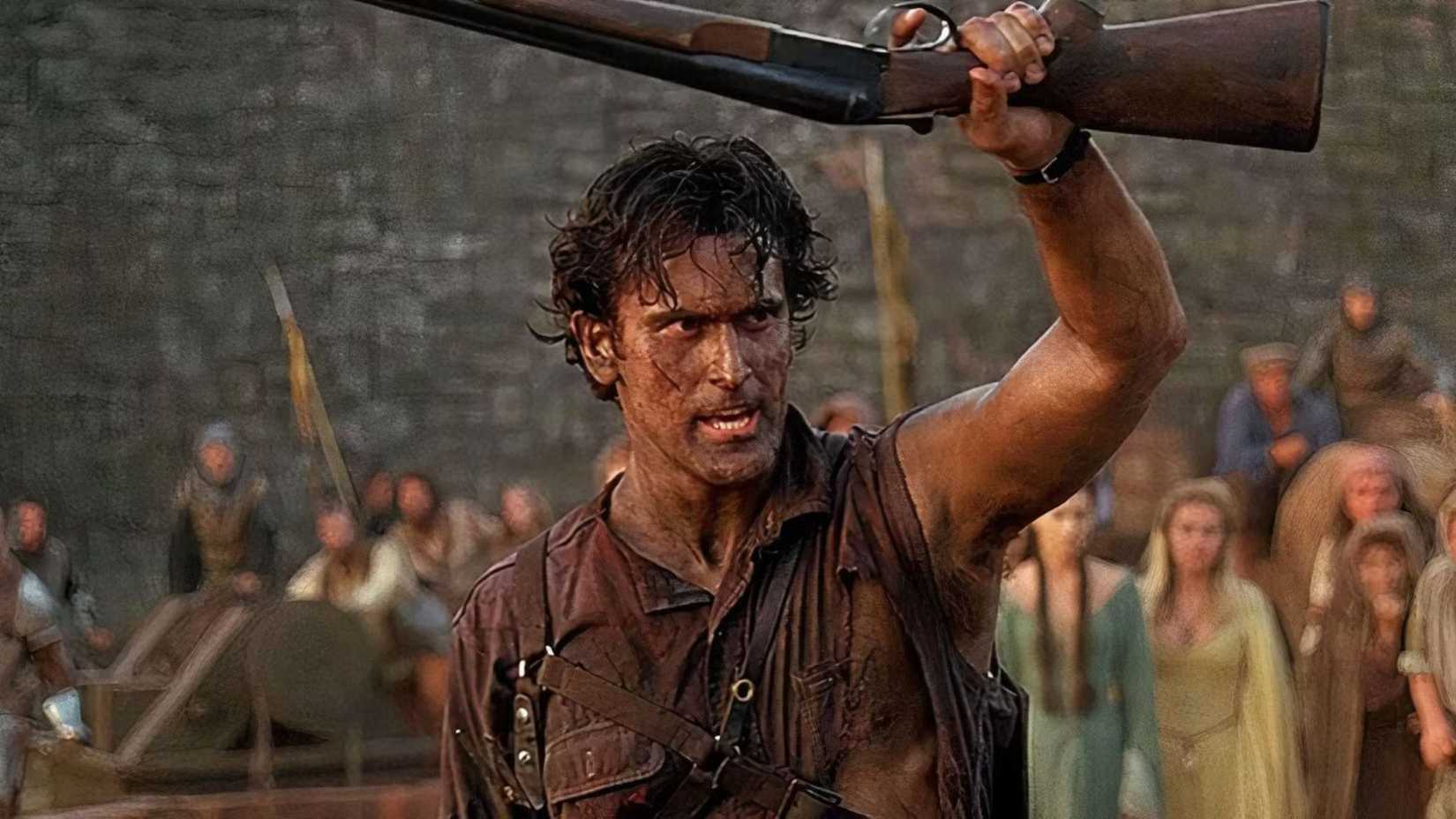 Bruce Campbell holding a gun as Ash in Army of Darkness