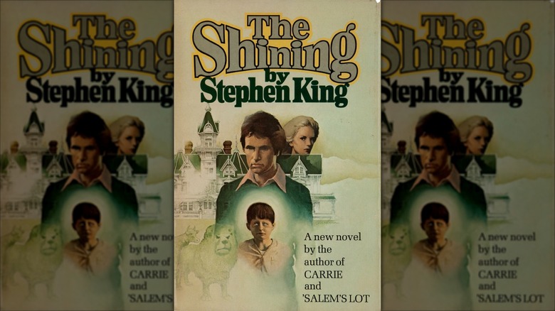 The Torrance family and the Overlook Hotel on the cover of the first edition of 