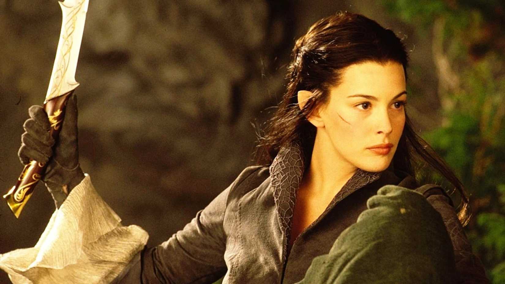 Arwen holds a sword in Lord of the Rings: The Fellowship of the Ring
