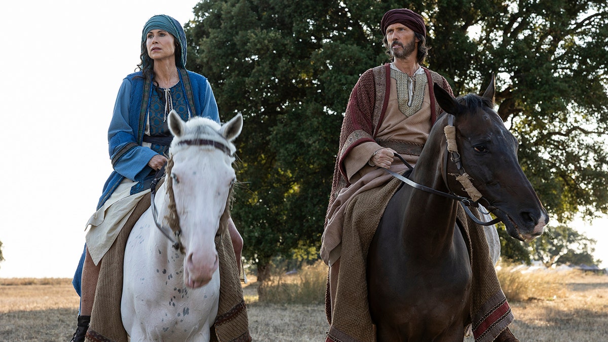 Minnie Driver and Jeffrey Donovan in a screengrab from "The Faithful" in March 2026.