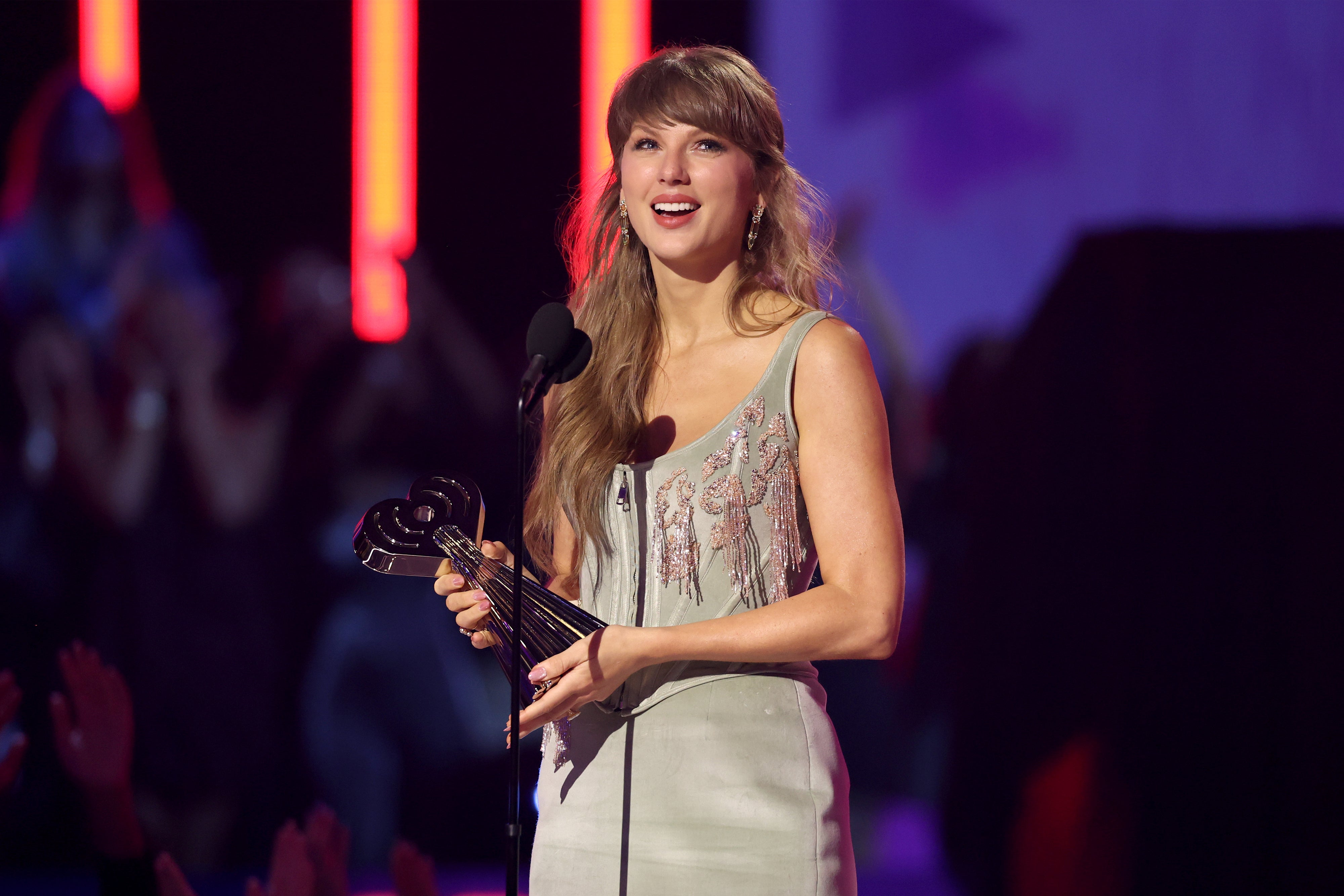 Taylor Swift accepts the award for Pop Album of the Year on stage during the 2026 iHeartRadio Music Awards.