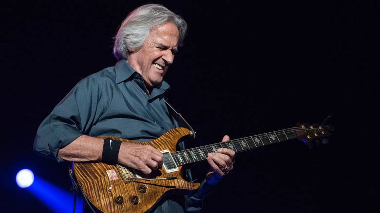 John McLaughlin still plays guitar