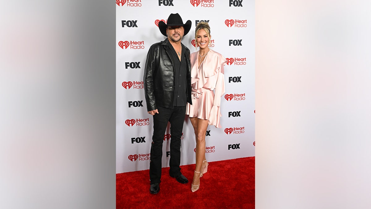 Brittany and Jason Aldean at the 2026 iHeartradio Awards in March.