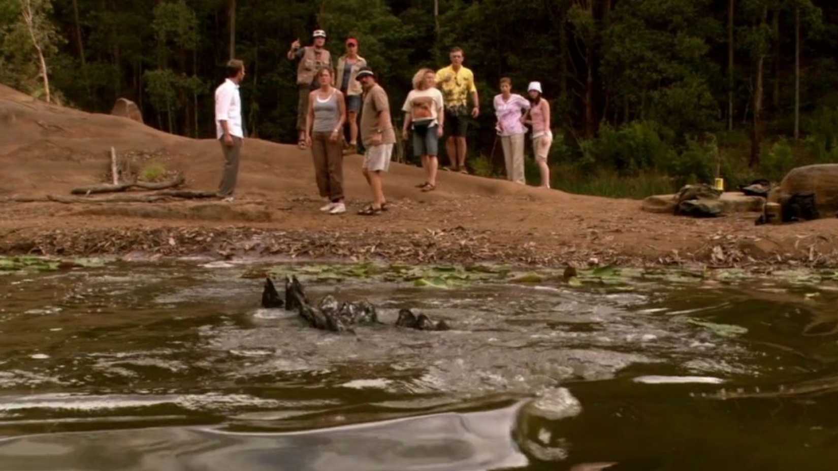 The survivors on the mud island see a giant crocodile in the Rogue River