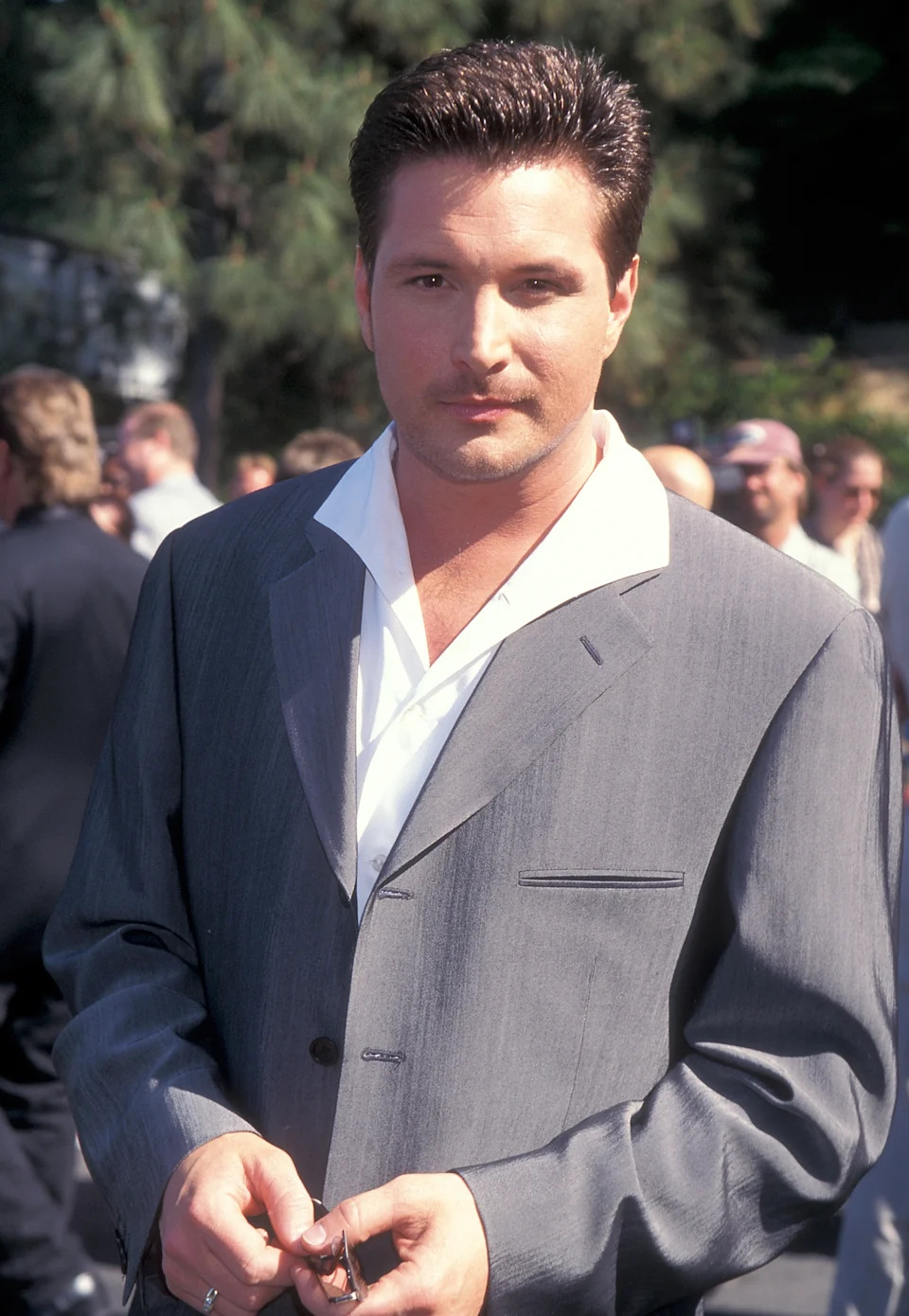 Herndon in a blue suit on the red carpet.
